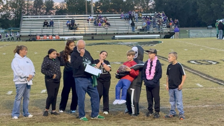 Mr. Reading Receiving the Extra Yard Award