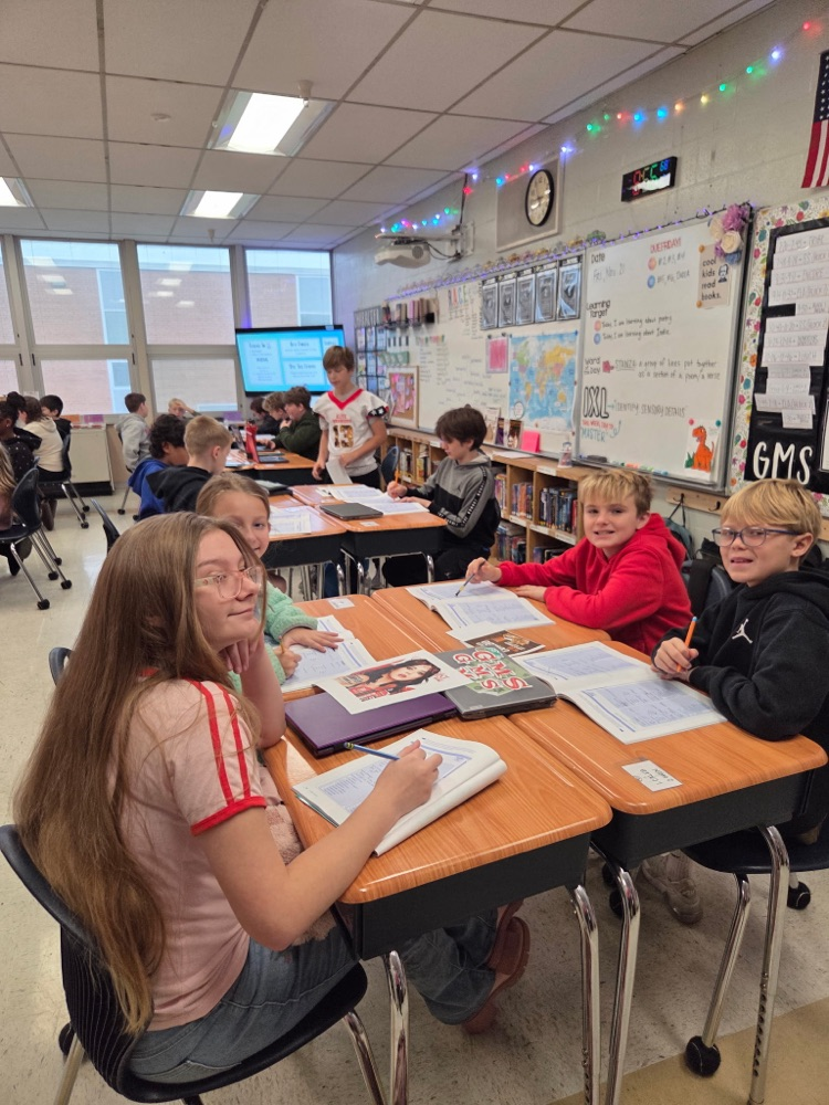 students and Mrs. Woods health class work together and show a dazzling smile!