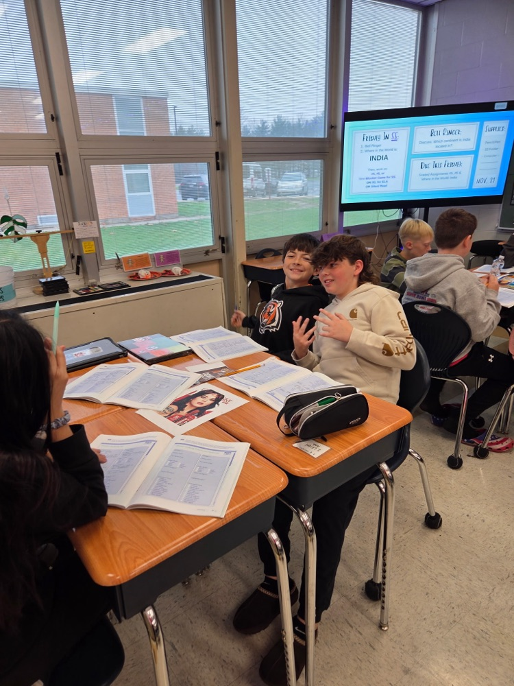 students and Mrs. Woods health class work together and show a dazzling smile!