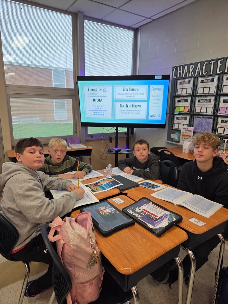 students and Mrs. Woods health class work together and show a dazzling smile!