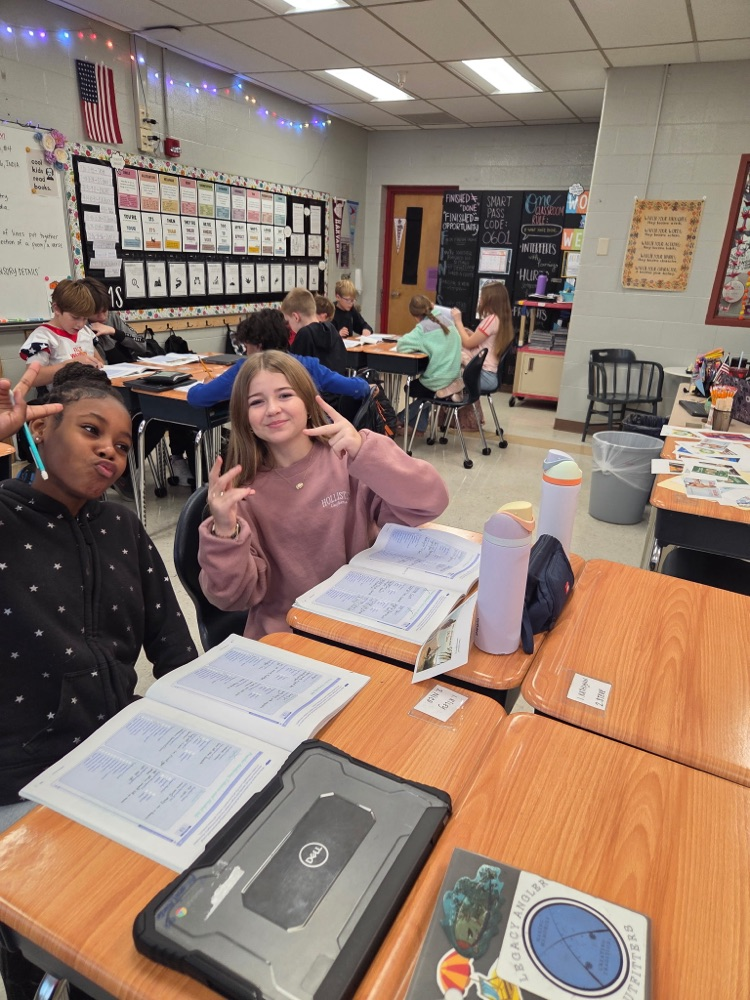 students and Mrs. Woods health class work together and show a dazzling smile!