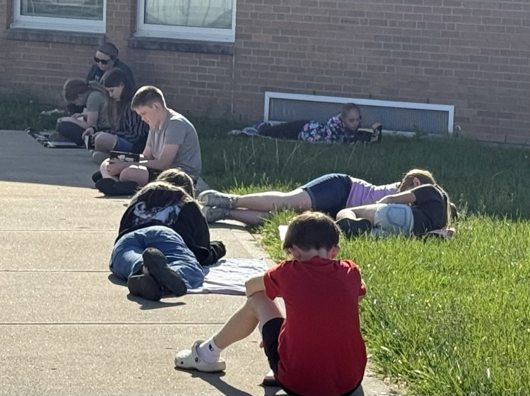 Mrs. Fine's 6th grade ELA students took full advantage of a beautiful day by reading outside!