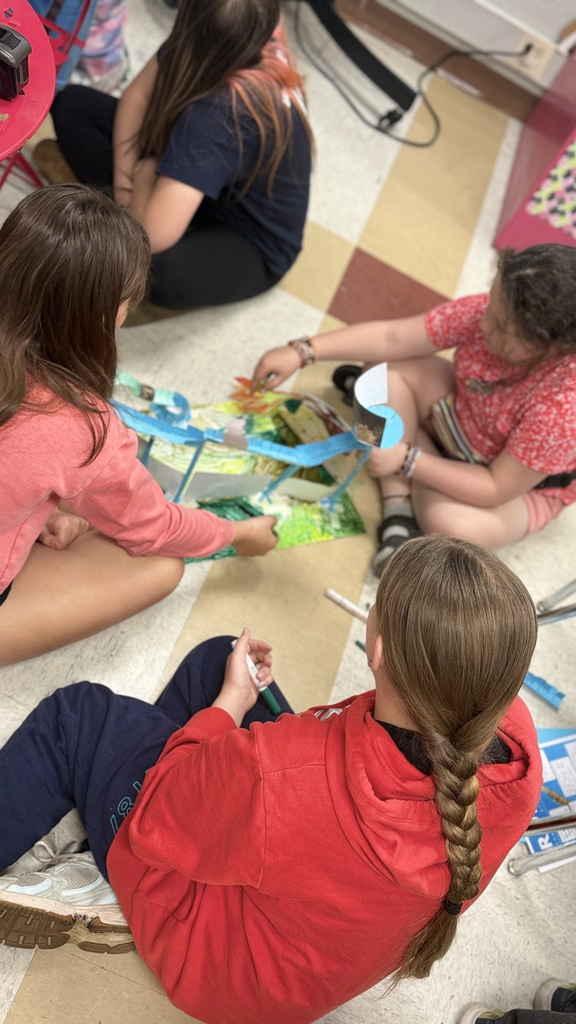 Students in Mrs. Velagic's classroom participated in the "Paper Roller Coaster" project in science to study kinetic and potential energy. 