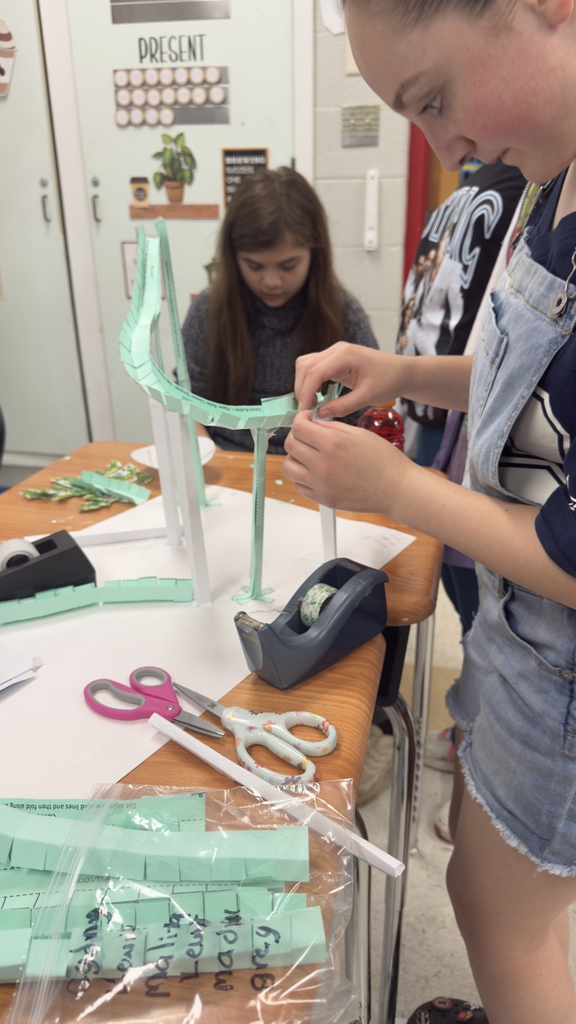 Students in Mrs. Velagic's classroom participated in the "Paper Roller Coaster" project in science to study kinetic and potential energy. 