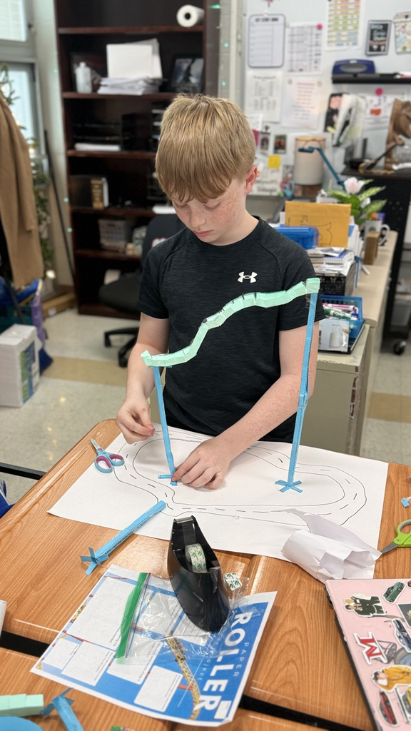 Students in Mrs. Velagic's classroom participated in the "Paper Roller Coaster" project in science to study kinetic and potential energy. 