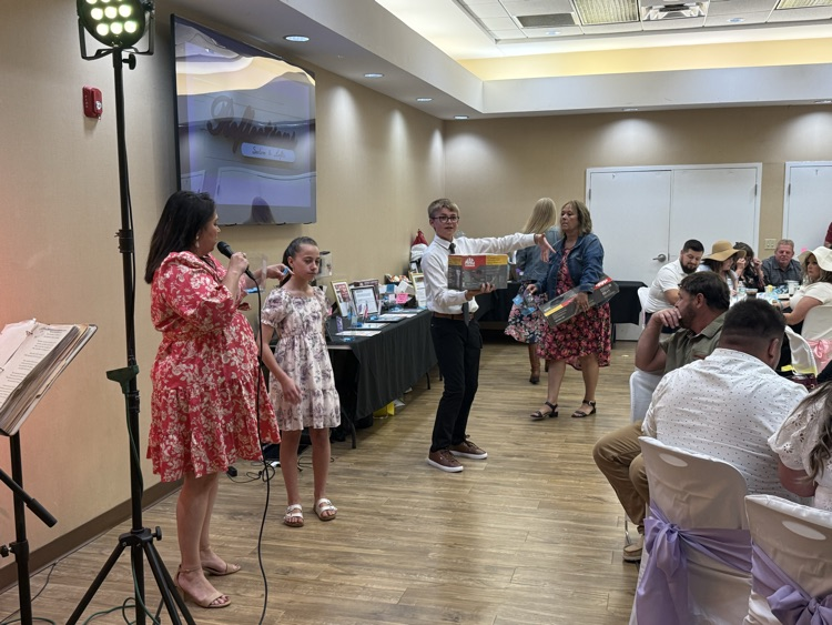 The GMS Leo Club enjoyed serving at the Goshen Community Cares Spring Garden Party fundraiser event on Saturday evening.