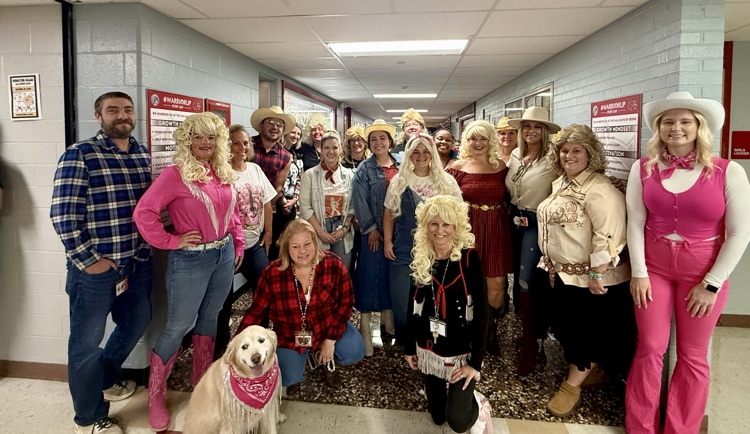 Goshen Middle School staff participated in “Dolly Day” as part of a “secret staff spirit day!” It