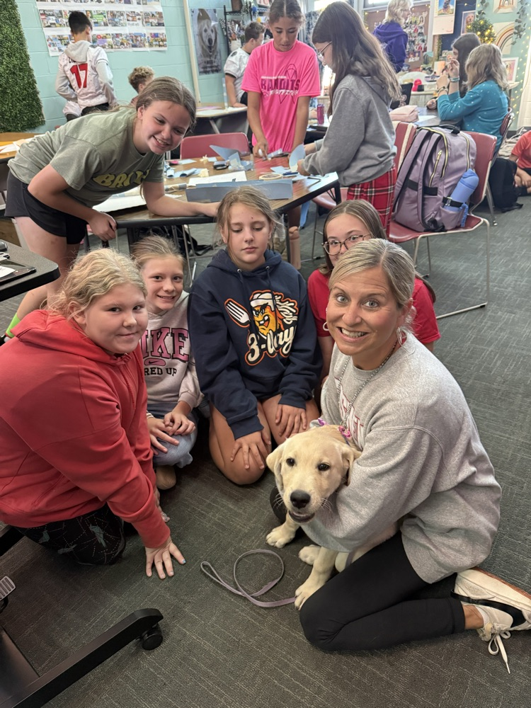 Today, Mrs. DeNu’s Career Tech class welcomed Marlys, Tina, and 6 Circle Tail puppies for a crucial lesson in socialization.
