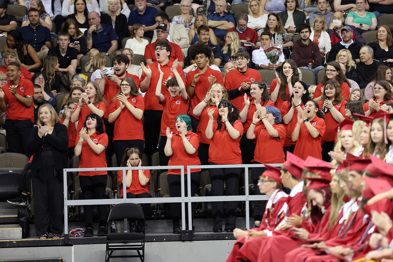 students cheering in bleachers