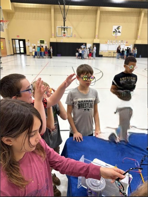 Students seeing the world through an insect's eyes.