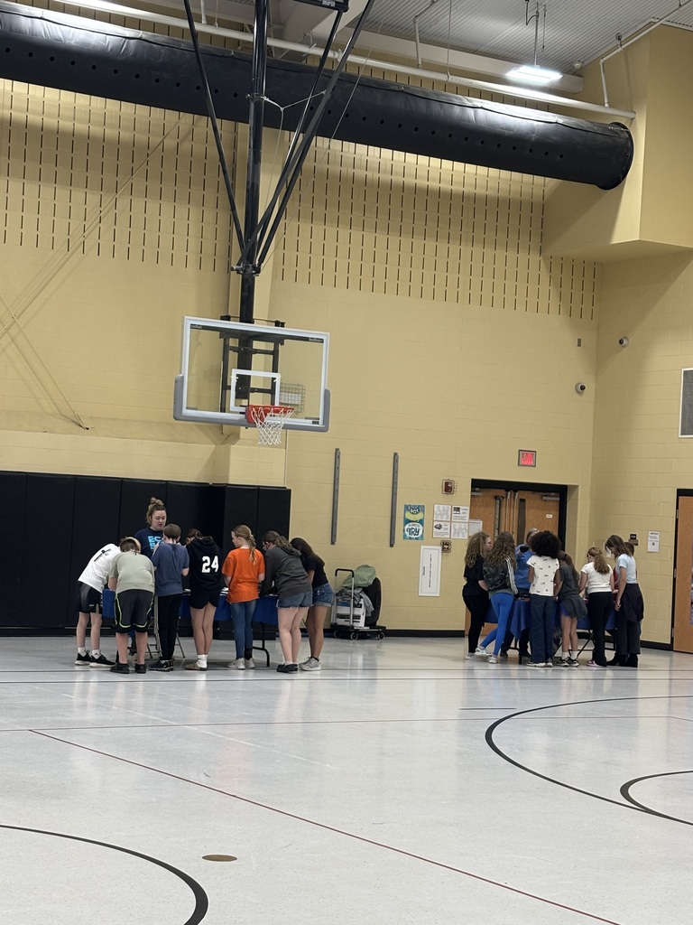 Students working through the stations to learn more about animal adaptations.