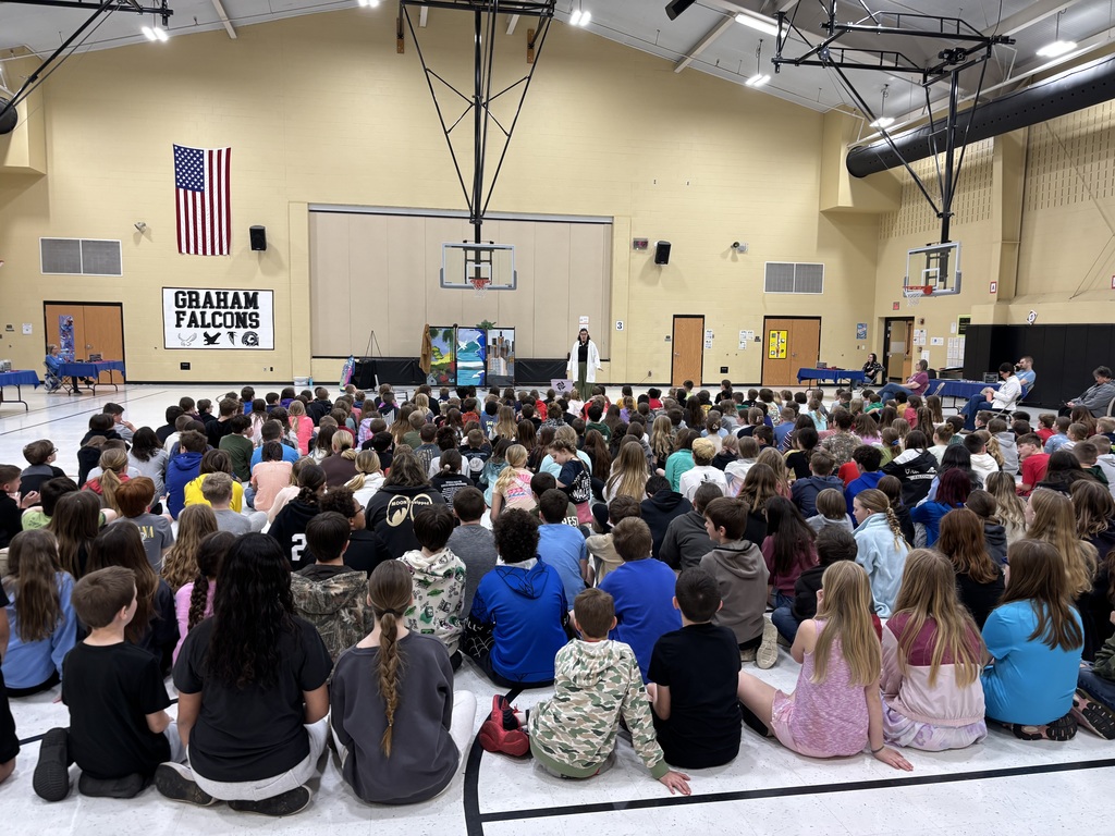 Students attending the stage show for Boonshoft learning about animal adaptations.