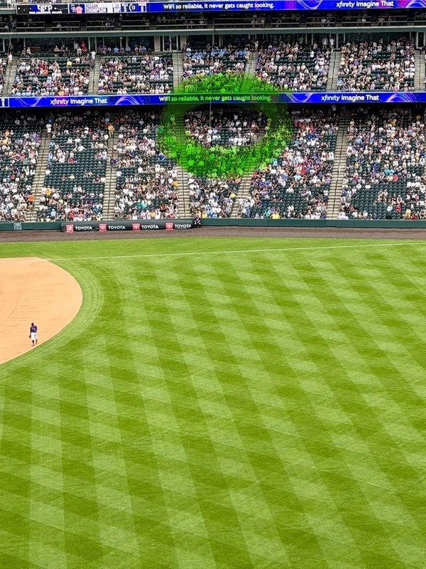 Students at baseball game in the bleachers