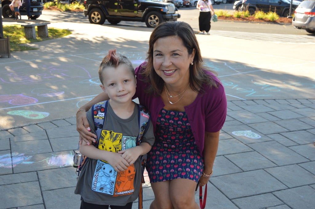superintendent with child