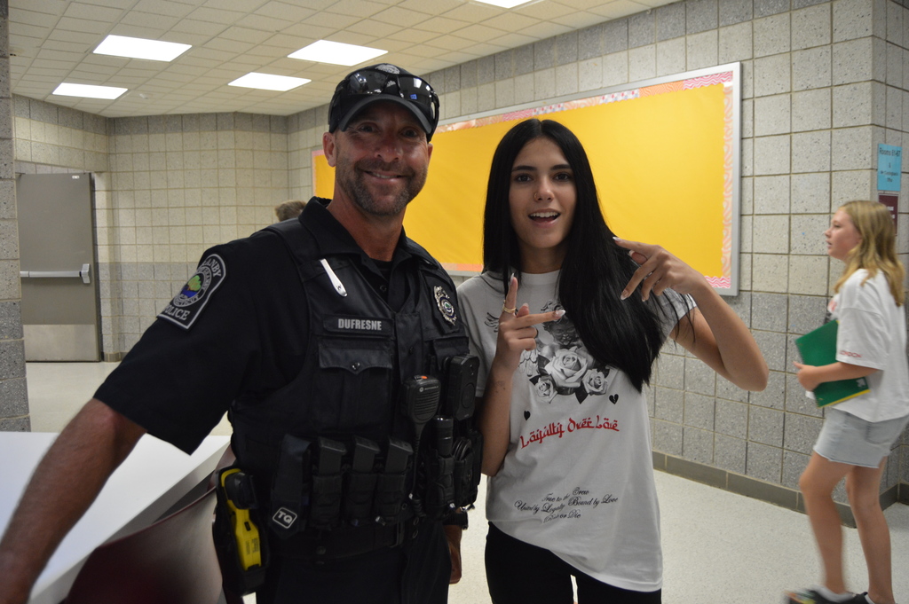 Police officer with middle school student