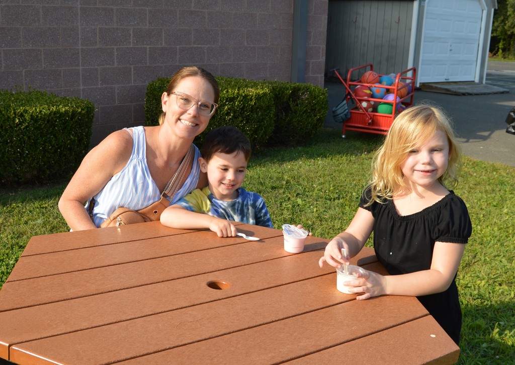 A family sitting at a table