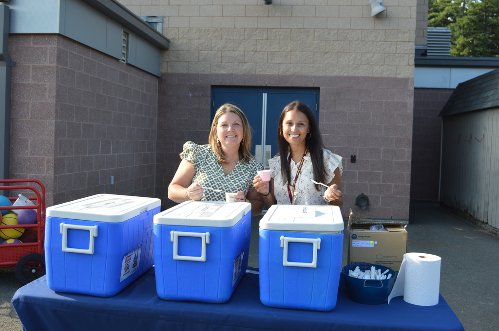 Mrs. Loveland and Mrs. Bava ready to serve ice cream to students and parents