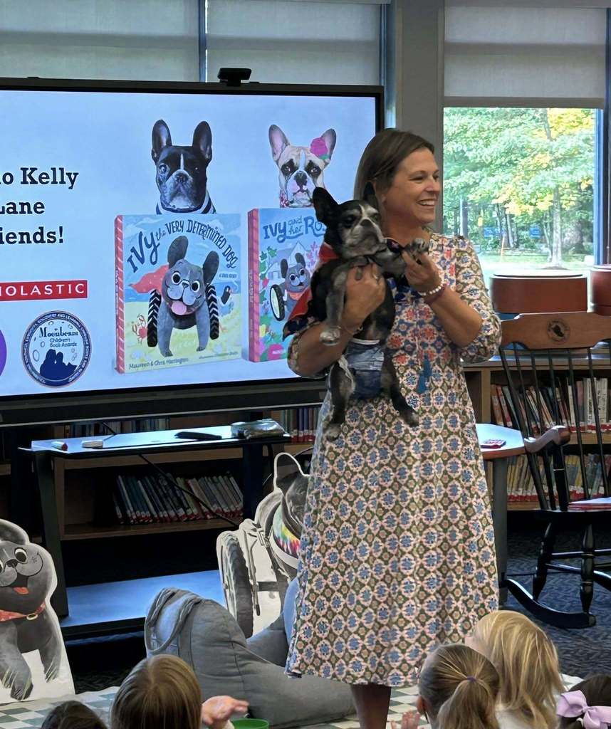 Photo of  Ivy the determined dog with her owner, Maureen, who is also the author of the book Ivy the Determined Dog