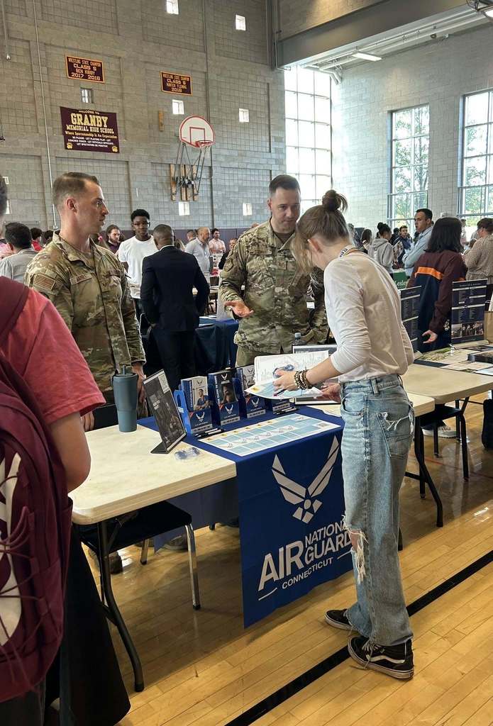 Student looking at a college booth