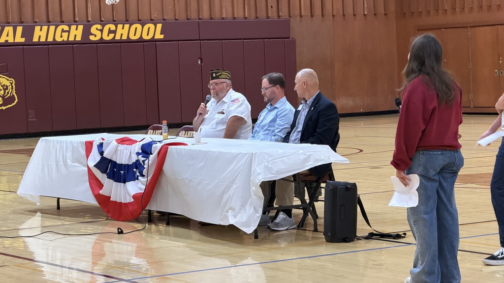 Panel photo of veterans speaking to students 
