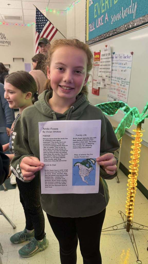 A student with her project on arctic foxes 