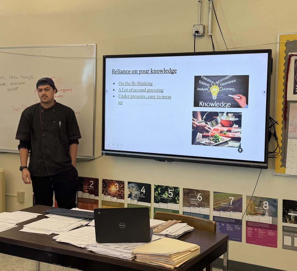 A student presenting their capstone project on being a chef