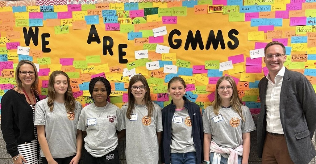 Principal Heather Tanis and Assistant Principal Alex Schwartz with students at Open House