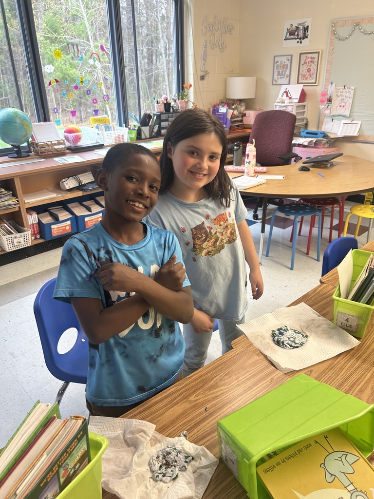 Two students with their Earth Day project.