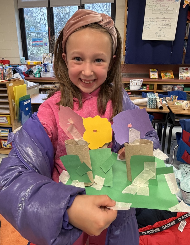Student with Earth Day project.