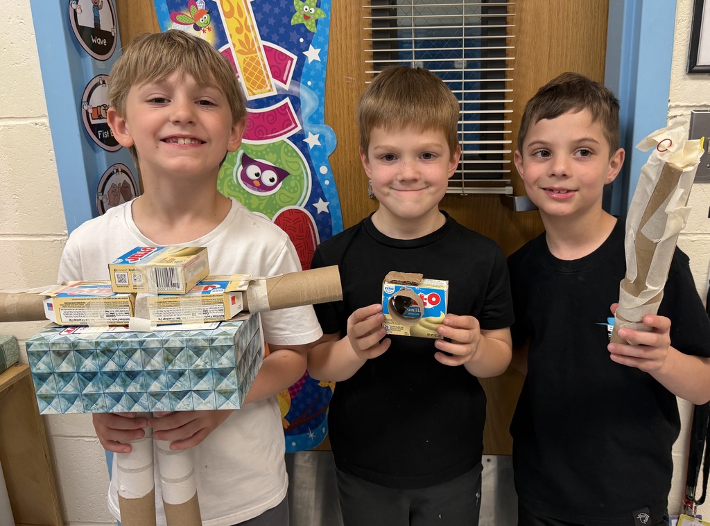 Three students with their STEAM projects