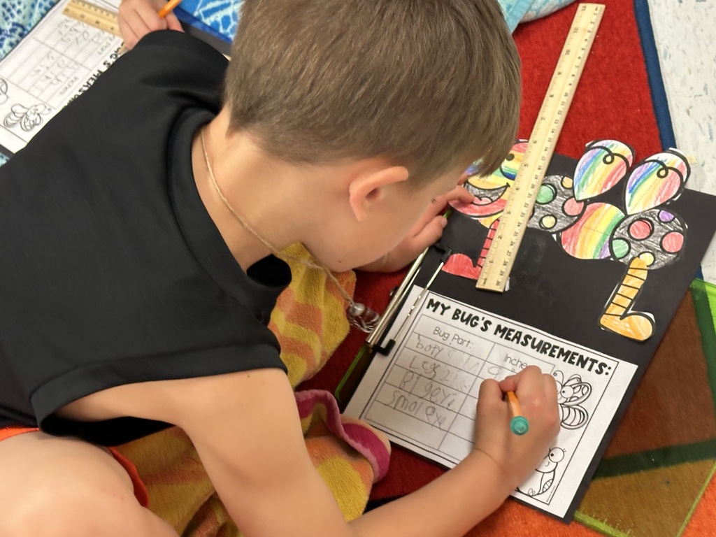 Boy measuring.
