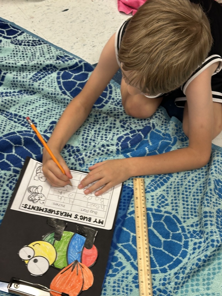 Boy writing.