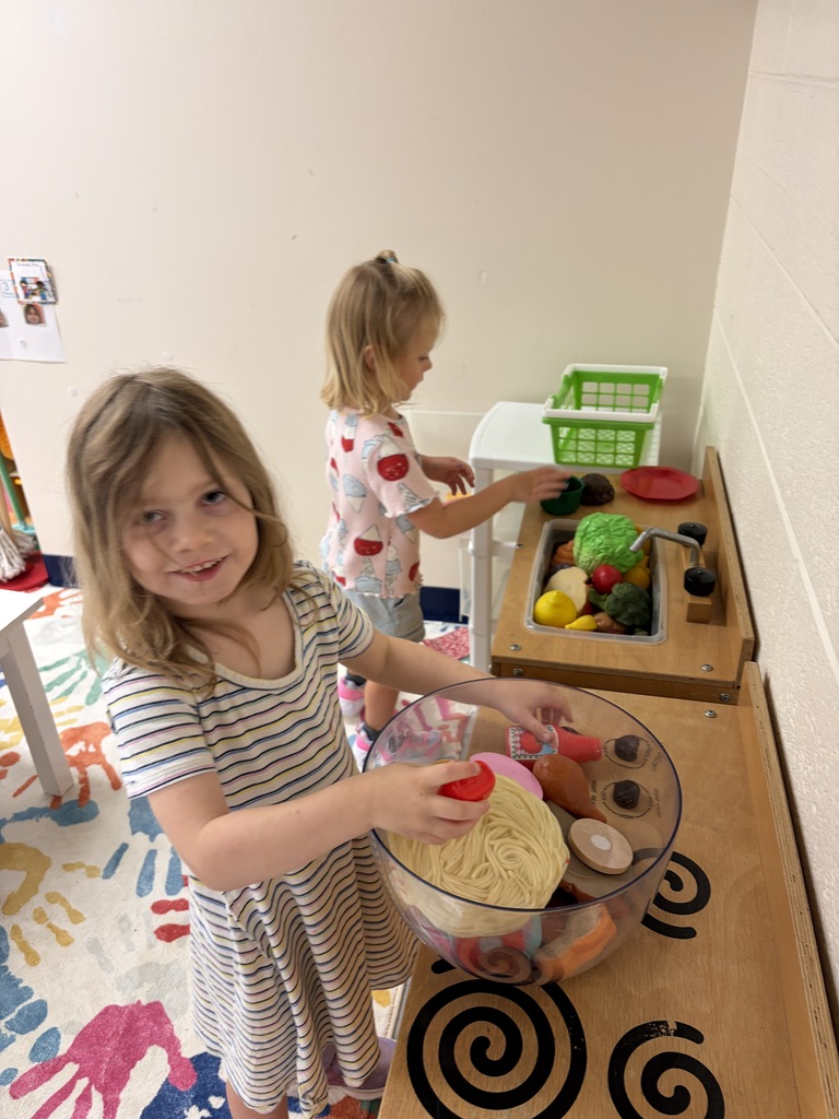 Students pretend cooking.
