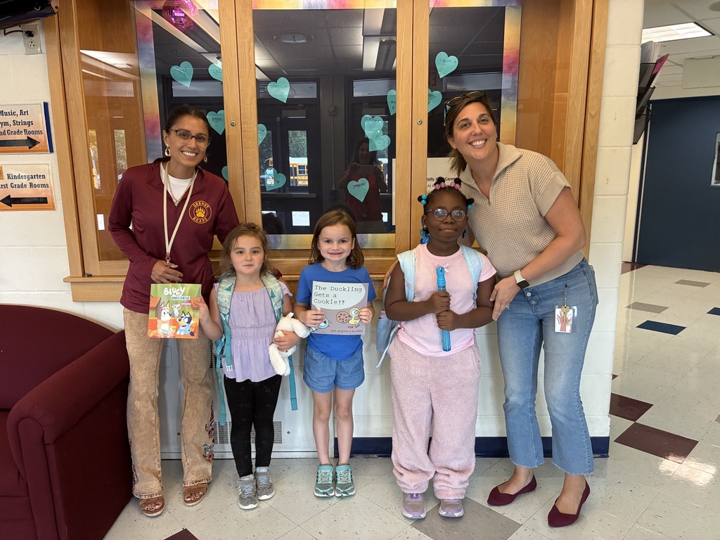Mrs. Loveland and Mrs. Diemer with pawsitive referral students.