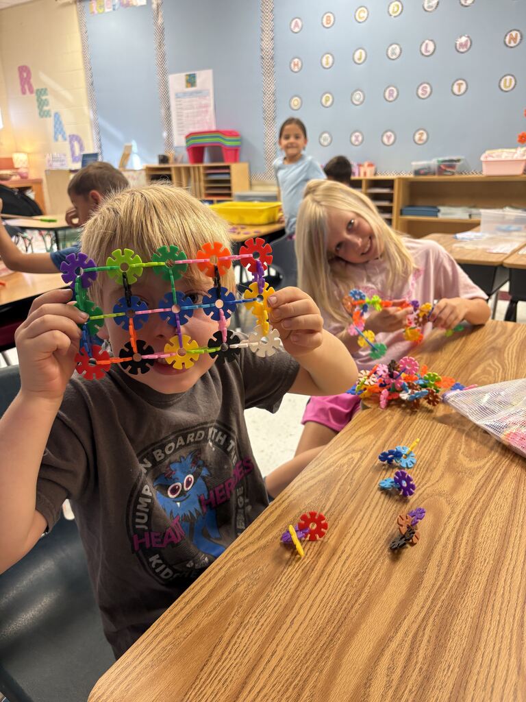 Students playing with connectors.