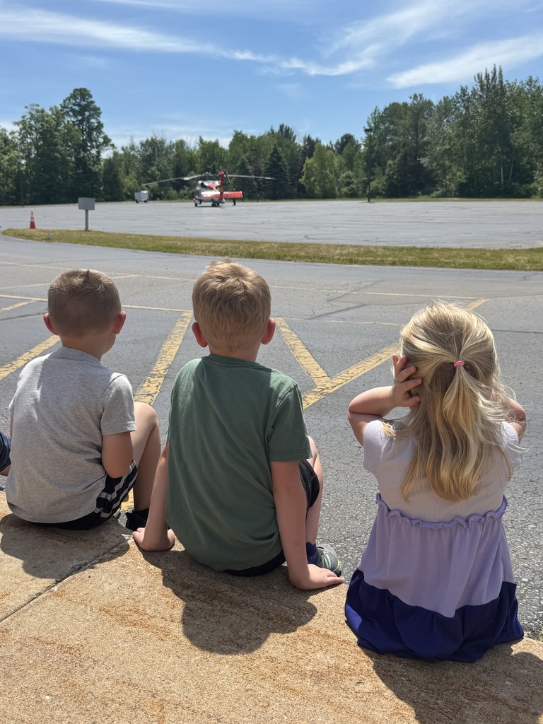 students and coast guard helicopter