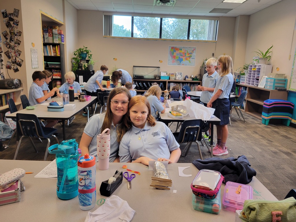 students sitting at a table