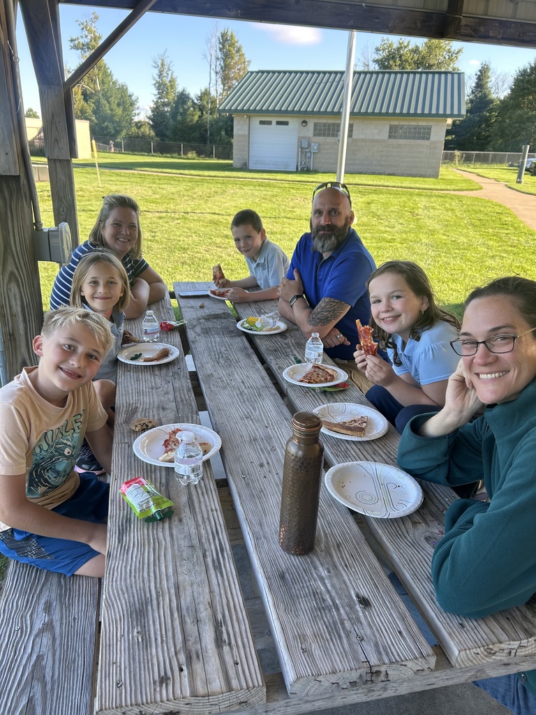 family at a picnic table