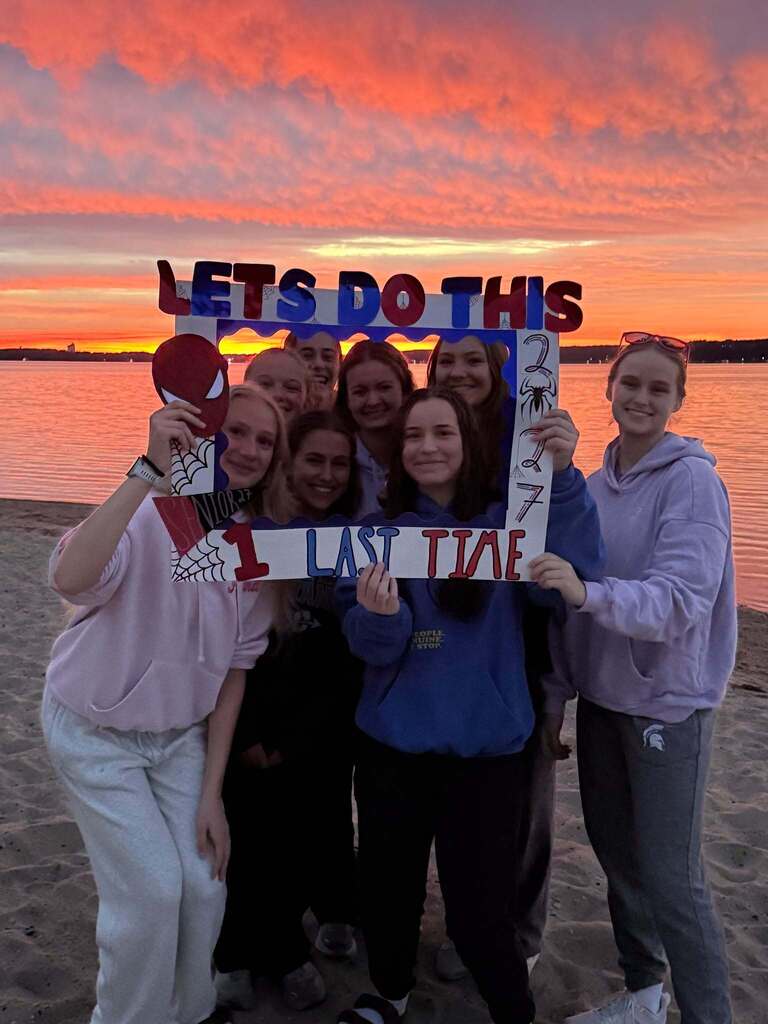 students watching the sun rise