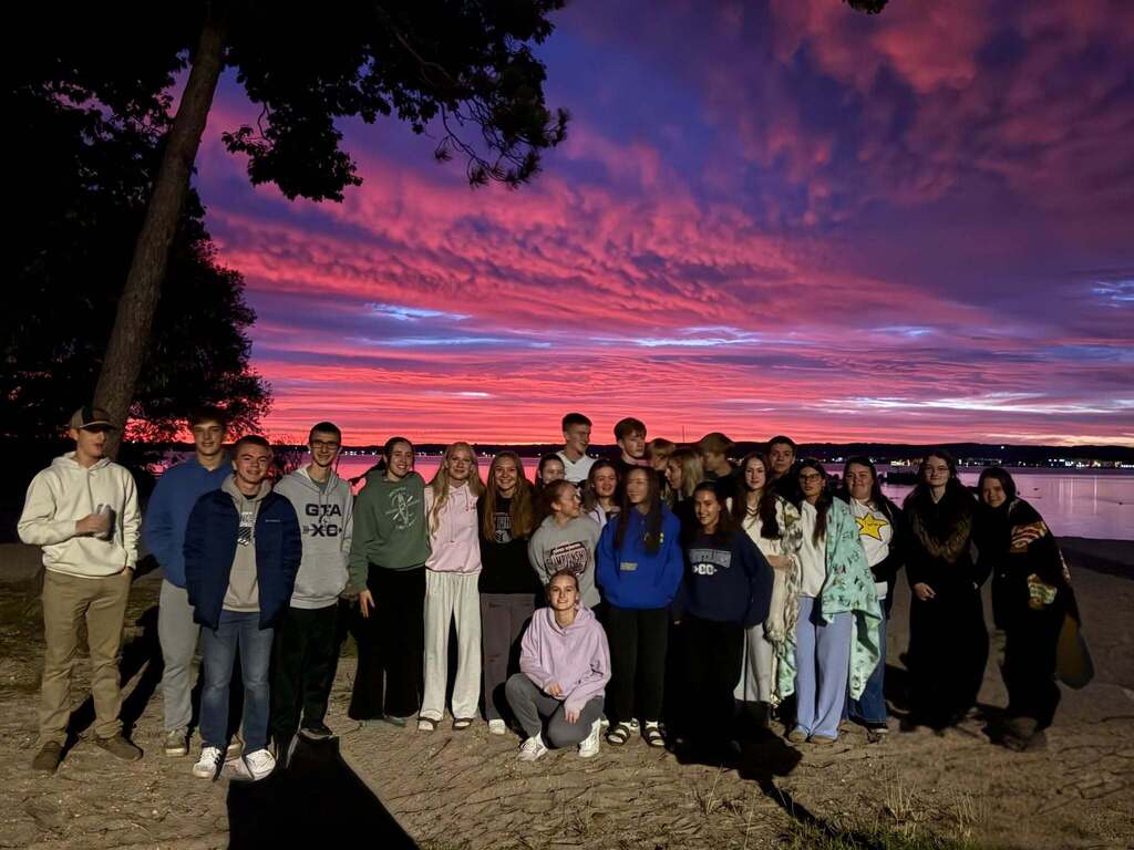 students watching the sun rise