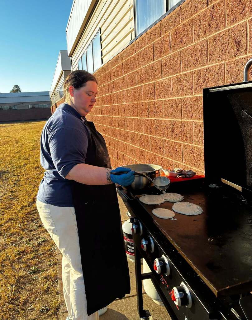 teacher making pancakes