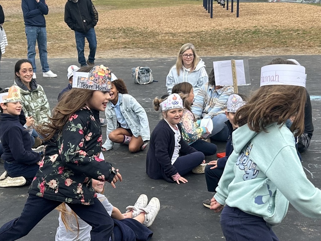 students and parents on playground