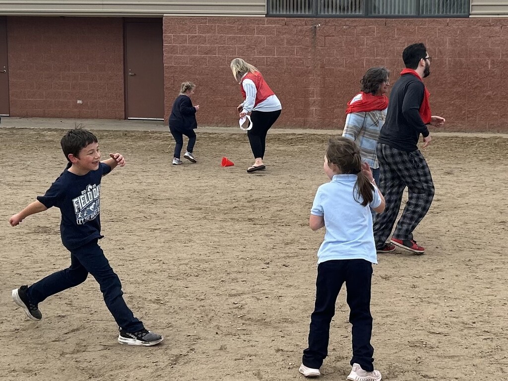 students and parents on playground