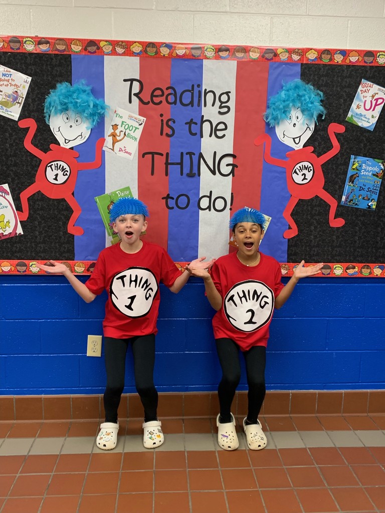 Dr. Ben reading to students