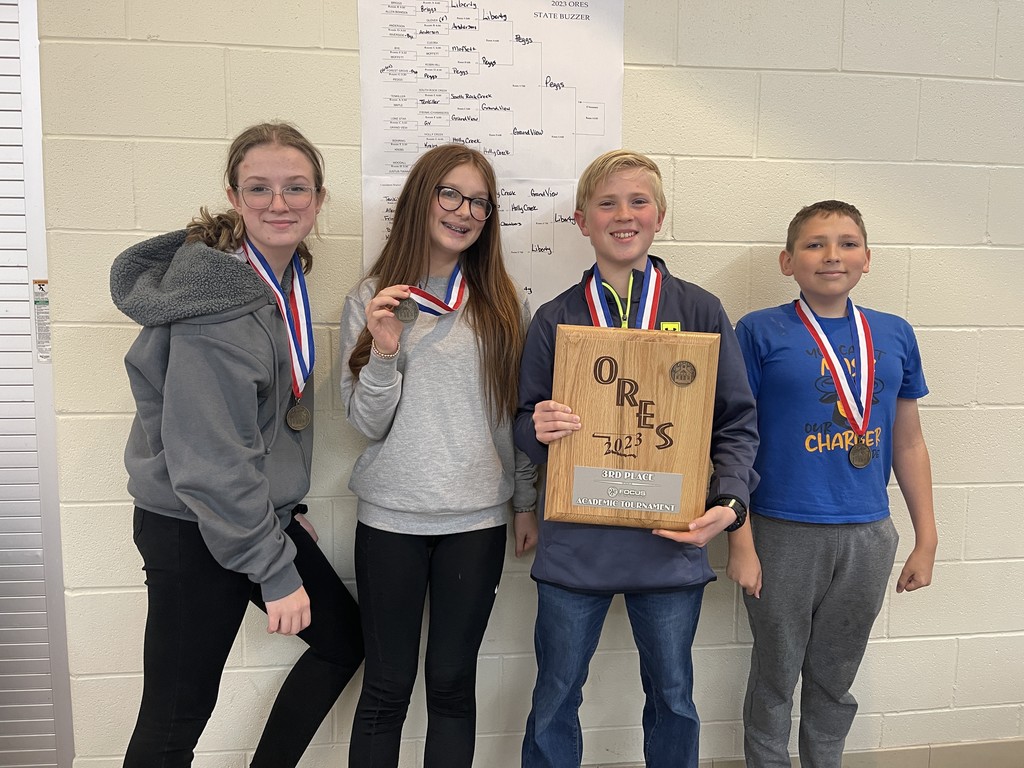 Academic Team Members pose for photo with their awards.
