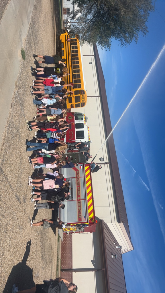 Students looking at fire truck