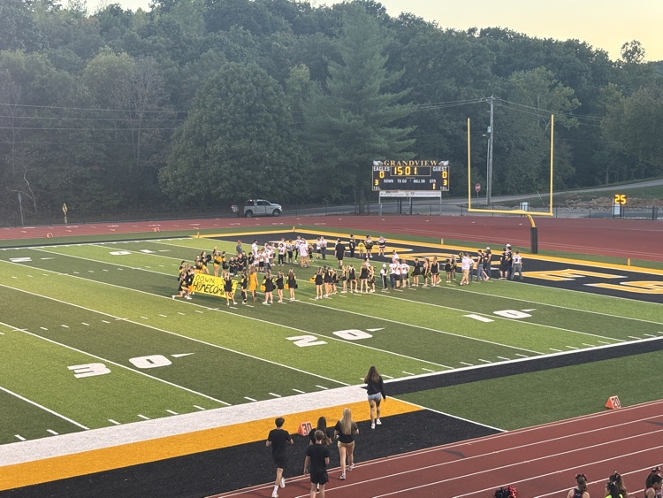 Cheer and Gridiron form the tunnel