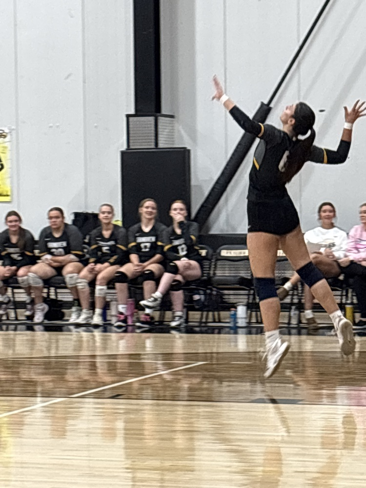 Miriam on the serve