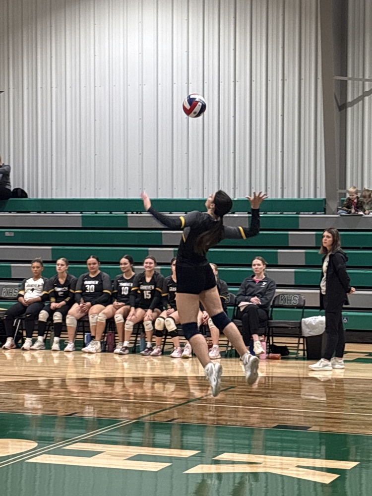 Miriam on the serve