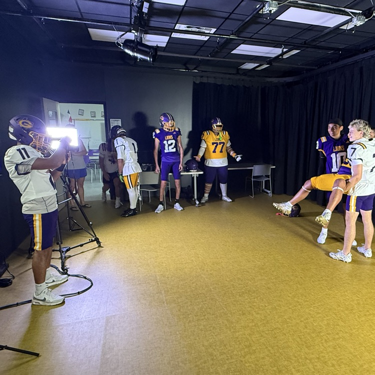 Chris Luna taking pictures at media day